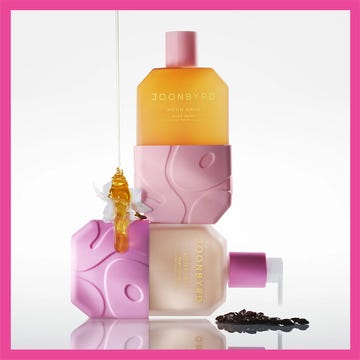 Three Joonbyrd body wash bottles with pink and amber packaging against contrasting backgrounds. Three Joonbyrd body wash bottles with pink and amber packaging against contrasting backgrounds.