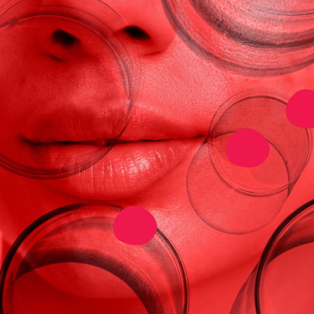 Close-up of a woman's lips surrounded by red circles and transparent shapes, creating an abstract artistic effect.