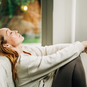 Frustrated depressed woman at home, lying on bed touching head, feeling sad upset. frustrated depressed woman at home, lying on bed touching head, feeling sad upset.