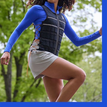 Two athletic women, one running in a blue top and vest, the other cycling on a path in a dark outfit.