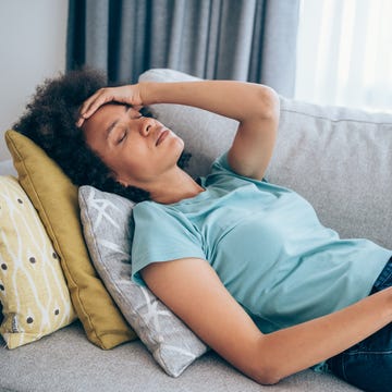 Woman with high fever at home. Woman with high fever at home.