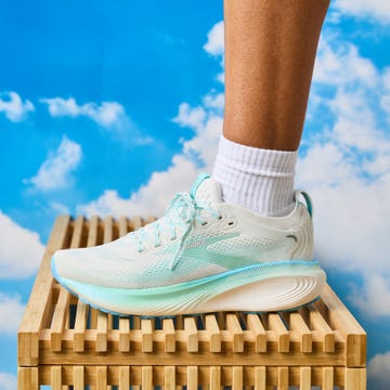 brooks adrenaline gts in teal and white on wooden box brooks adrenaline gts in teal and white on wooden box