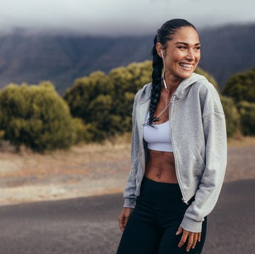 cheerful fitness woman on morning workout