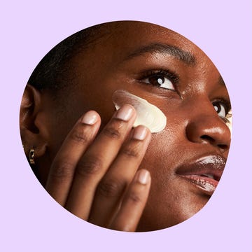 Peach & Lily Advanced Rebound Biogl glow Zombie Cream with a model applying the cream to her face.