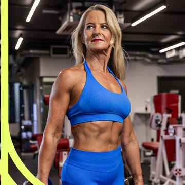 Woman exercising with ropes and weights in a gym. Woman exercising with ropes and weights in a gym.