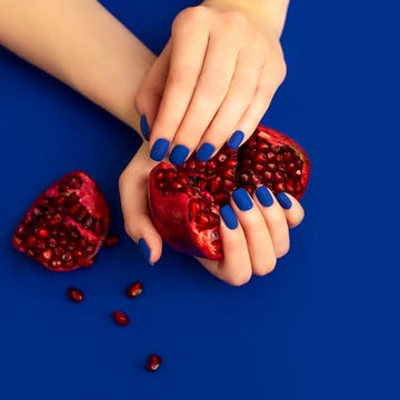 blue manicure with gold and lace background blue manicure with gold and lace background