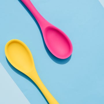 bright colored spoons on a colored background