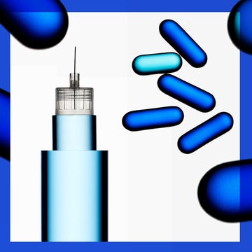 Syringe and blue capsules.