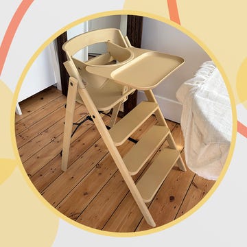 wooden high chair with a tray in a room with wooden flooring kaos klapp highchair review kaos klapp high chair review