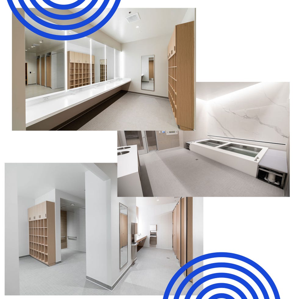 Modern restroom interior featuring mirrors, cubbies, and a sleek design.