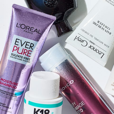 Collection of various hair care products, including shampoos and styling treatments. Collection of various hair care products, including shampoos and styling treatments.