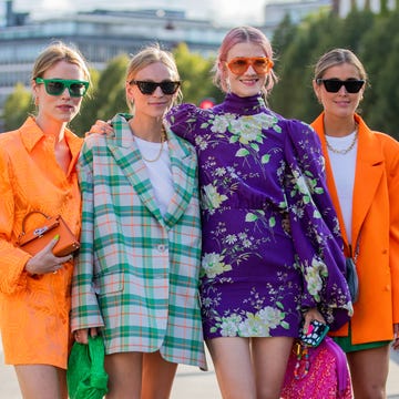 copenhagen, denmark august 11 annabel rosendahl, tine andrea wearing green checkered oversized blazer darja barannik wearing orange dress, blazer, purple dress seen outside baum und pferdgarten on august 11, 2021 in copenhagen, denmark photo by christian vieriggetty images