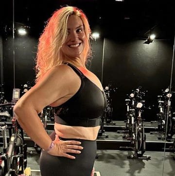 a woman in a black tank top mega hoffman