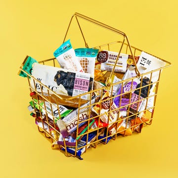 shopping basket full of protein bars