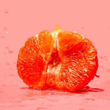 how to make yourself squirt concept a vibrant half of a citrus fruit hue and creating a striking visual contrast