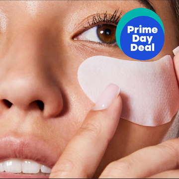 Woman applying eye patches with a promotional label for a Prime Day deal.
