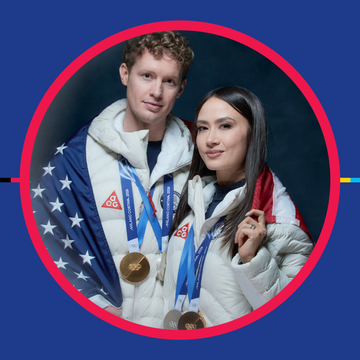 two individuals wearing medals and jackets celebrating a victory two individuals wearing medals and jackets celebrating a victory