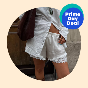 Two women in stylish button-up shirts and shorts walking down the street; inset of lace-trimmed shorts with Prime Day deal badge.