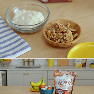 Ingredients and kitchen items for baking, featuring flour, walnuts, eggs, bananas, and protein smoothie powder. Ingredients and kitchen items for baking, featuring flour, walnuts, eggs, bananas, and protein smoothie powder.