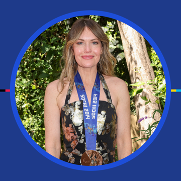 person wearing a medal with a floral dress