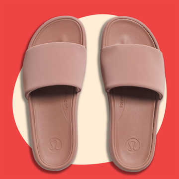 Gray and pink slide sandals on contrasting backgrounds. Gray and pink slide sandals on contrasting backgrounds.
