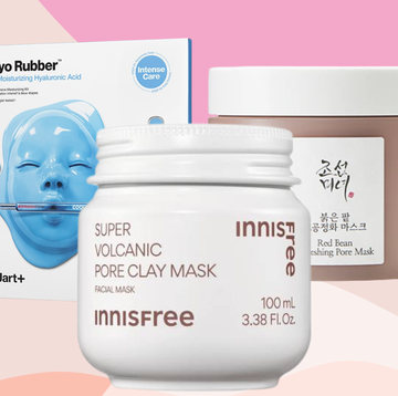 skincare products displayed alongside a person posing peace sign