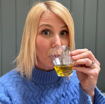 writer drinking a daily shot of extra virgin olive oil as part of the viral tiktok wellness trend